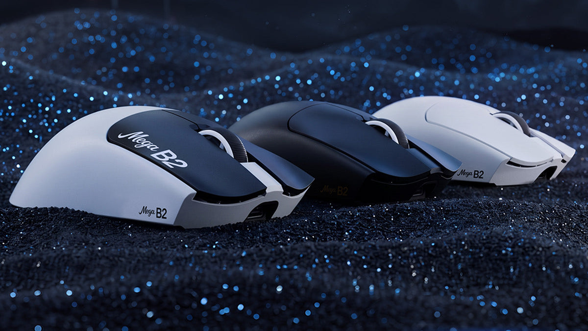 Attack Shark Mega B2 wireless gaming mice in white and black, three side profiles lined up on dark blue glittering fabric