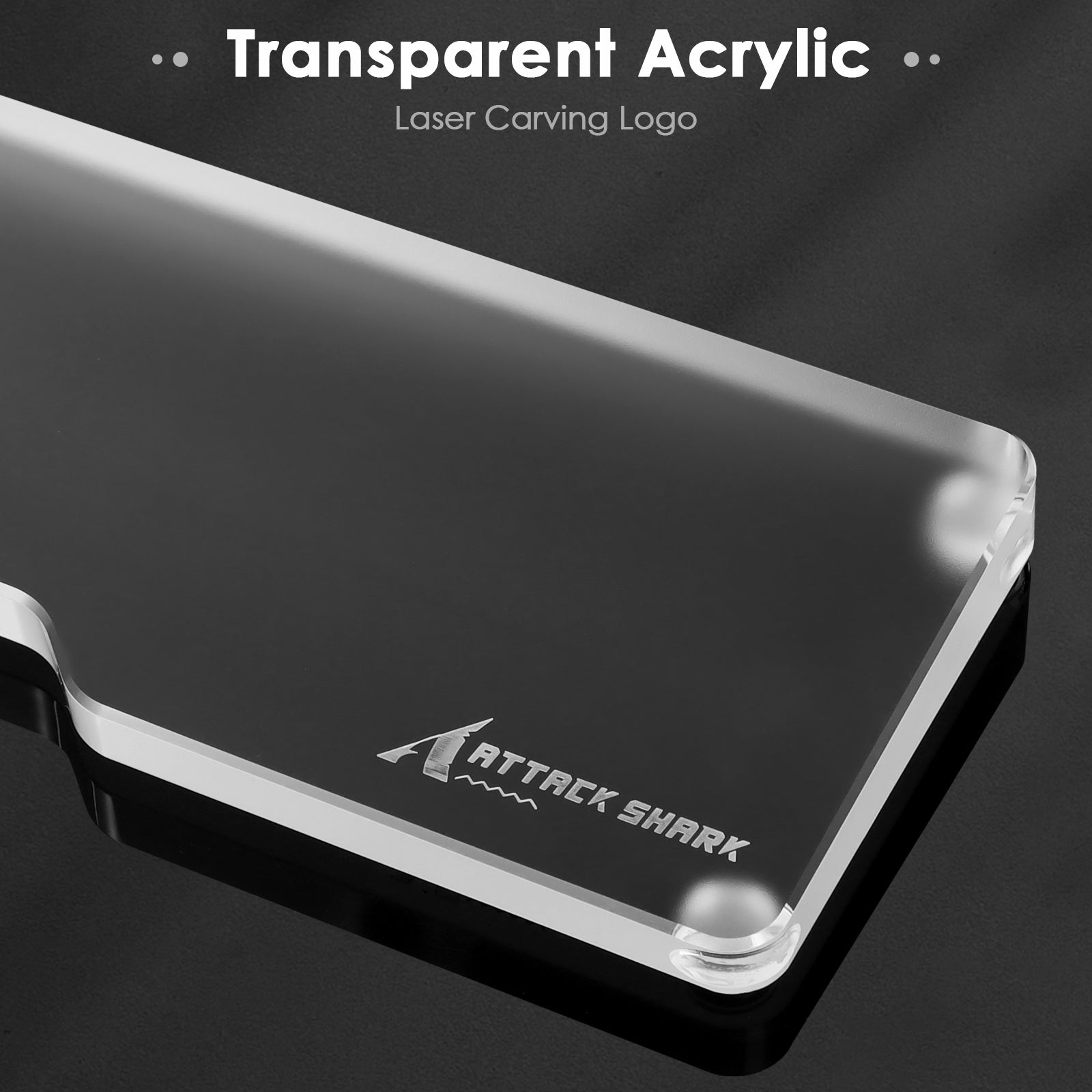 Clear acrylic wrist rest with Attack Shark logo carved, showcasing transparent design.