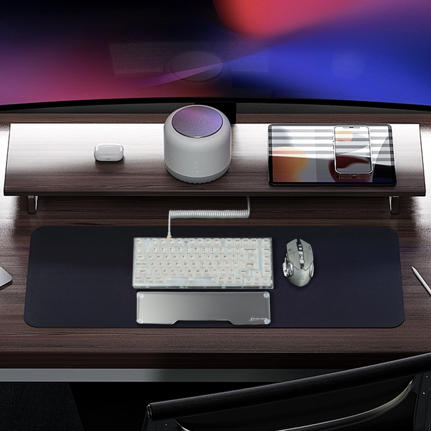 Stylish gaming setup featuring mechanical keyboard, acrylic wrist rest, and mouse.