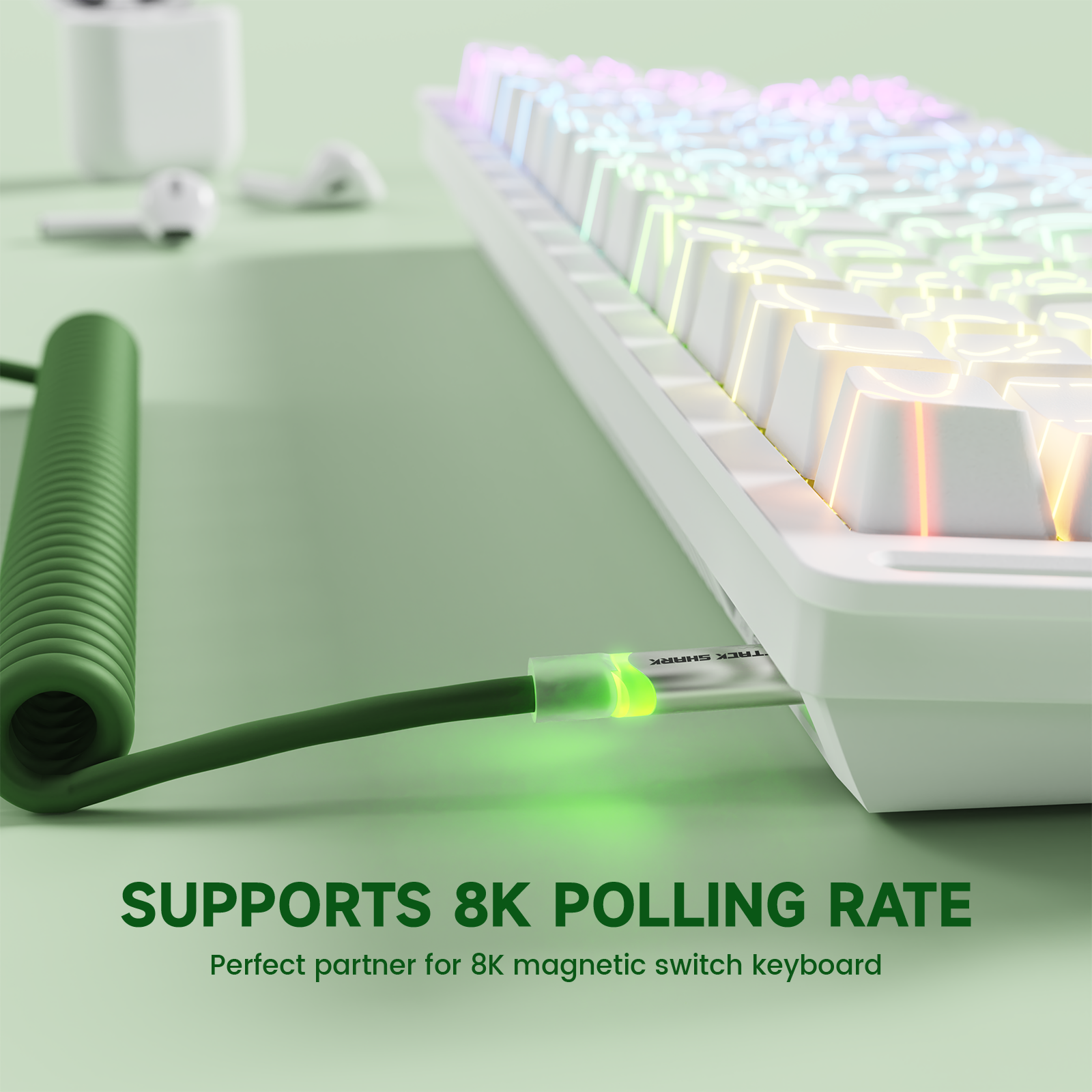 ATTACK SHARK green coiled USB-C cable connected to white keyboard, supporting 8K polling rate.