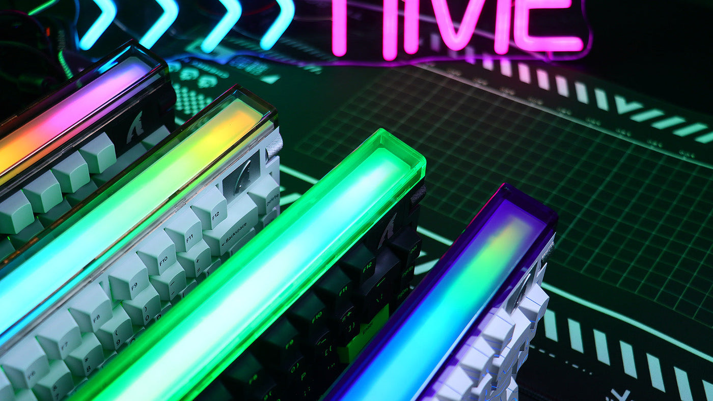 Attack Shark mechanical gaming keyboard featuring a prominent top-mounted RGB light bar displaying vibrant custom colors