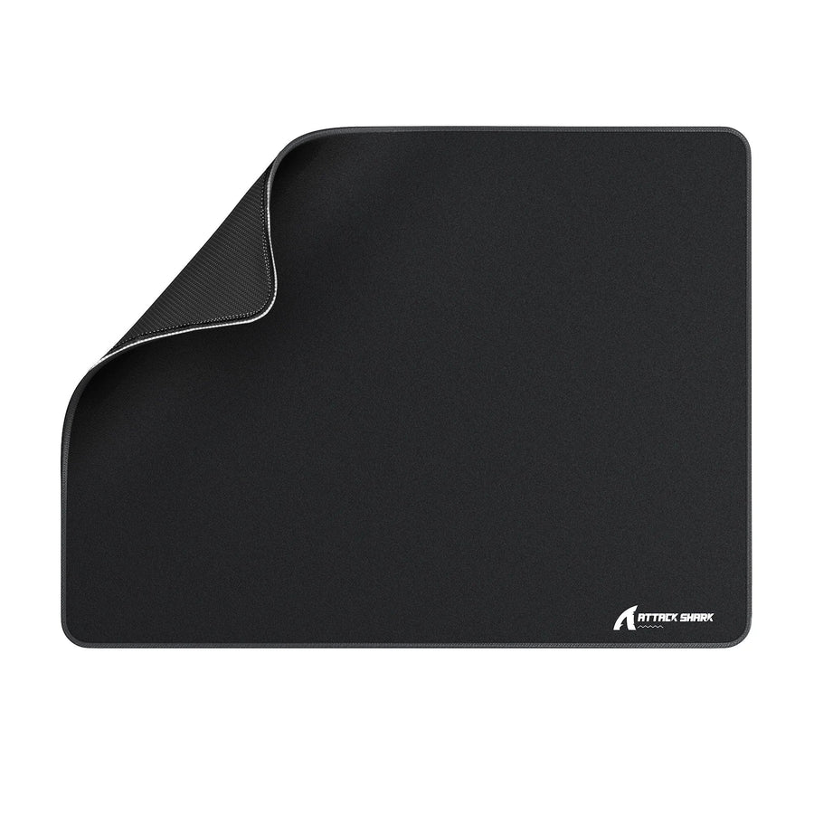 Cloth gaming mousepad shown in a tidy desk-cleaning setup