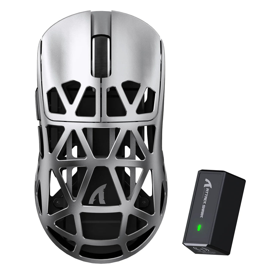 Gaming mouse with its wireless receiver arranged on a clean desktop