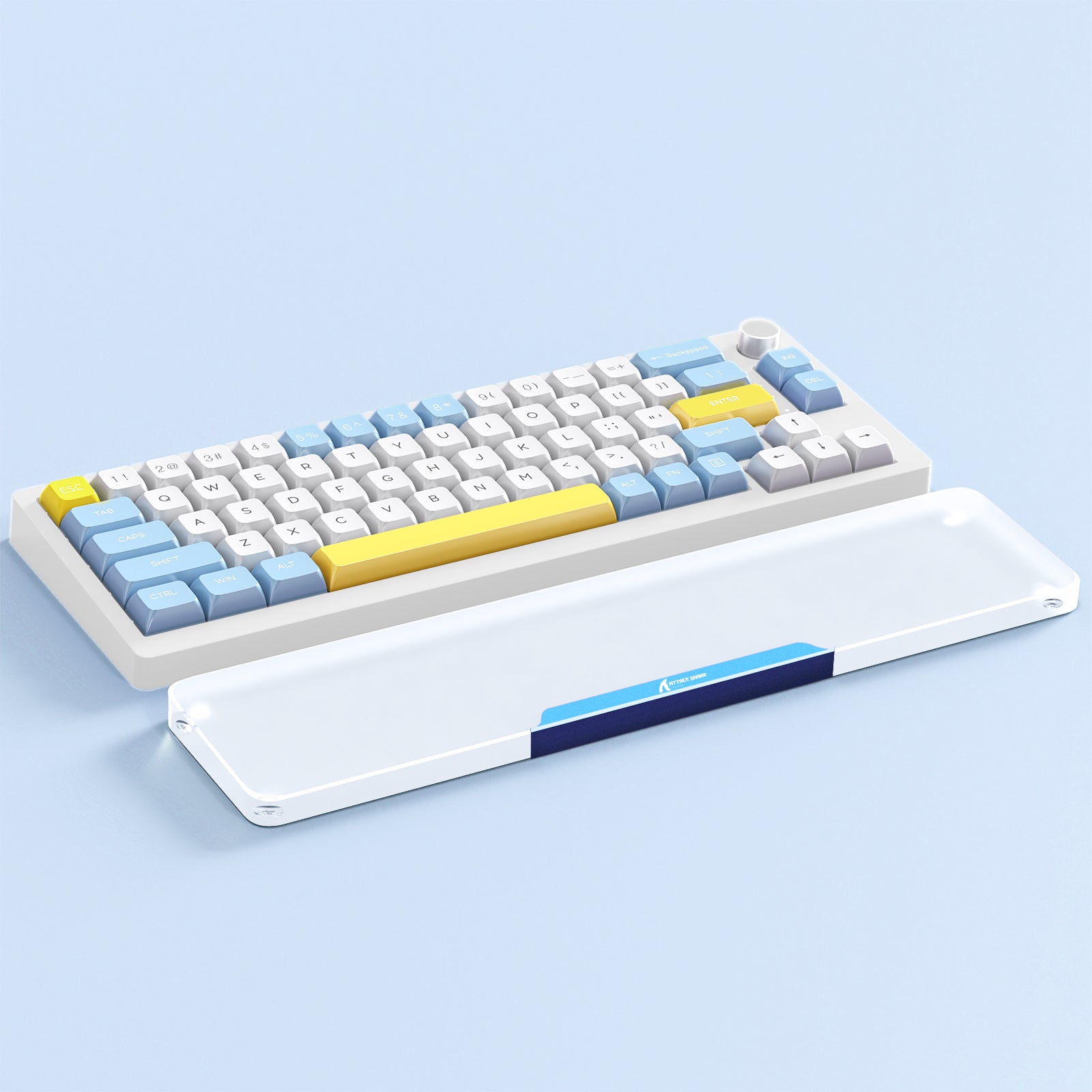 87-key mechanical keyboard with yellow and blue keycaps and acrylic wrist rest