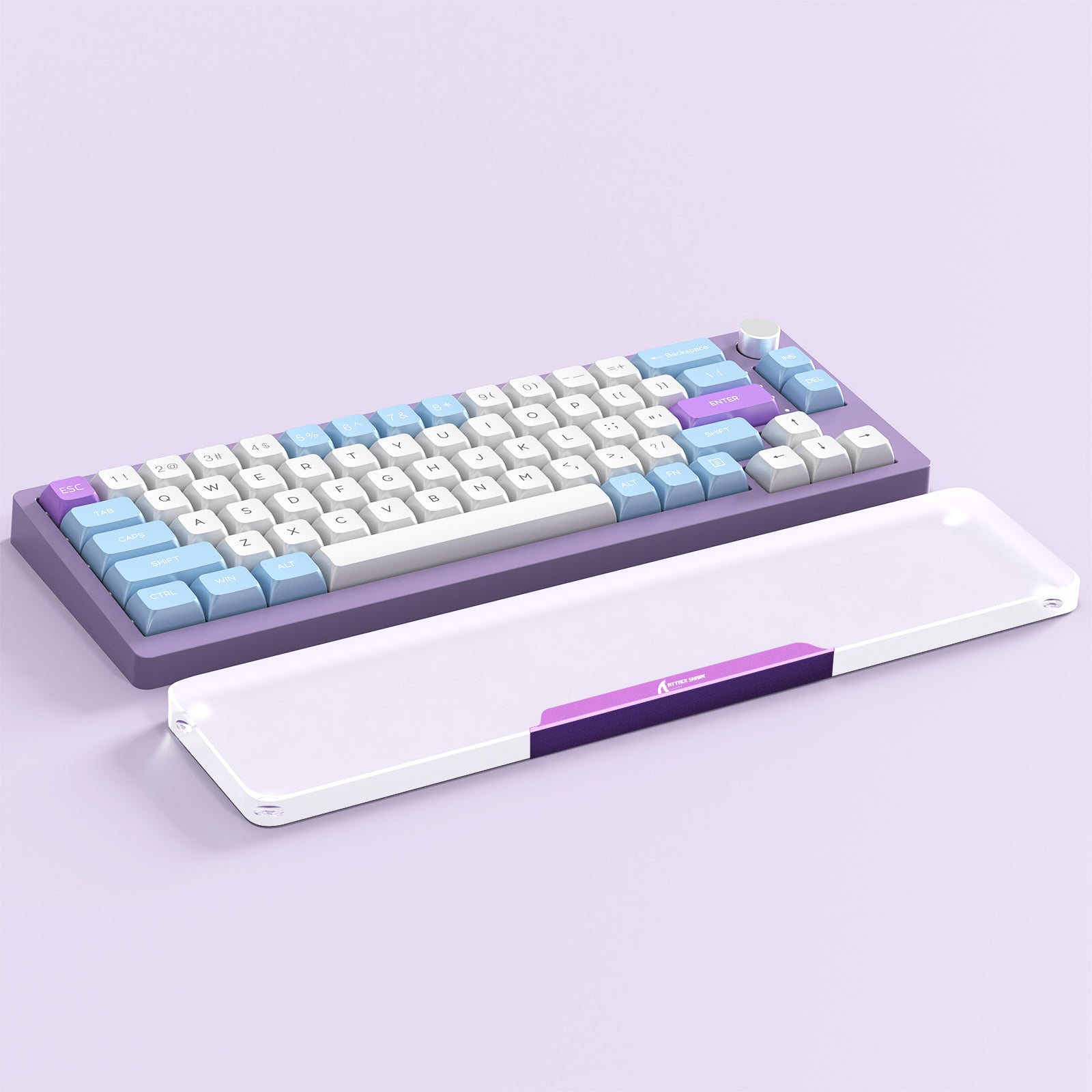 Purple and blue keycap mechanical keyboard with white translucent wrist rest.