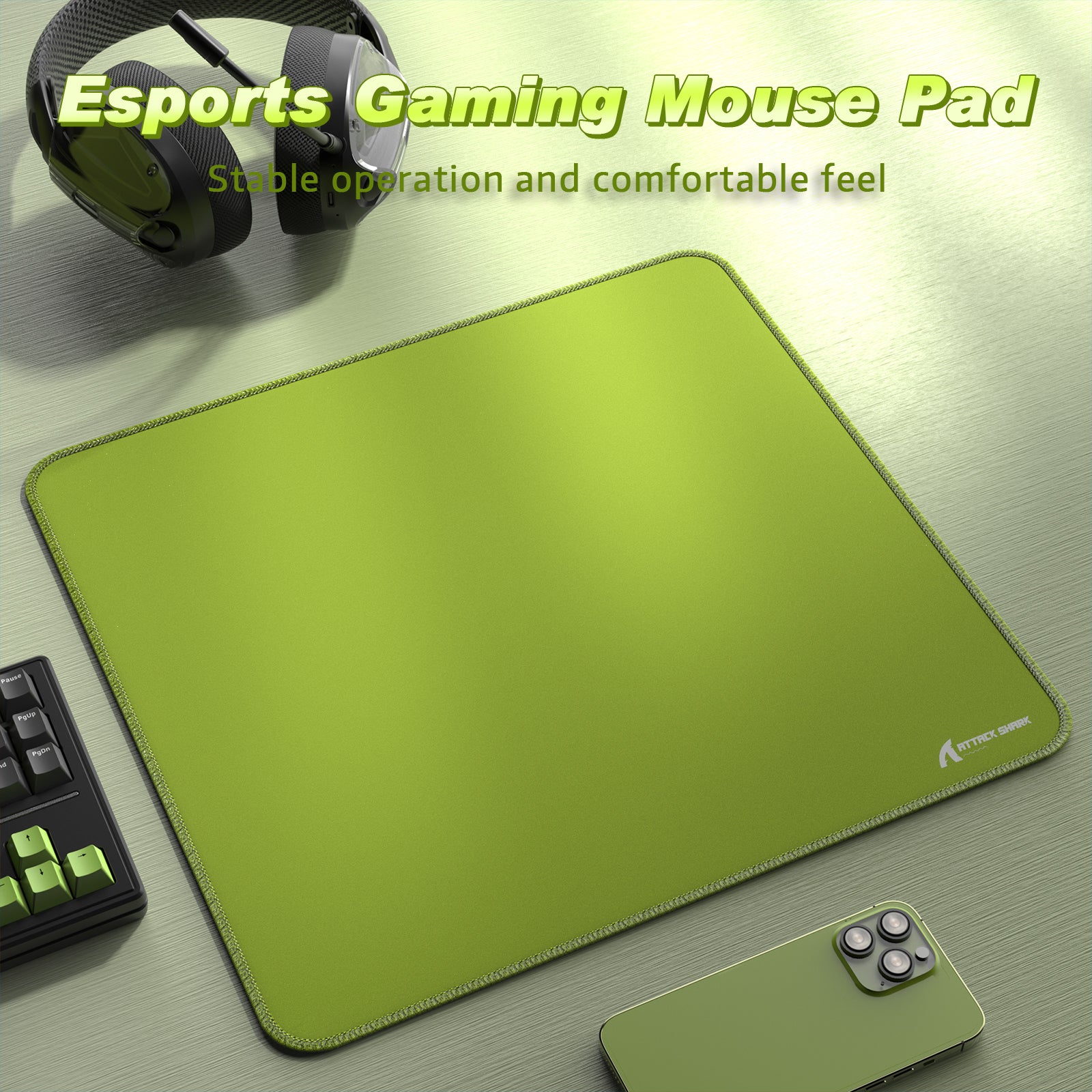 Green esports gaming mouse pad with stitched edges for stability and comfort.