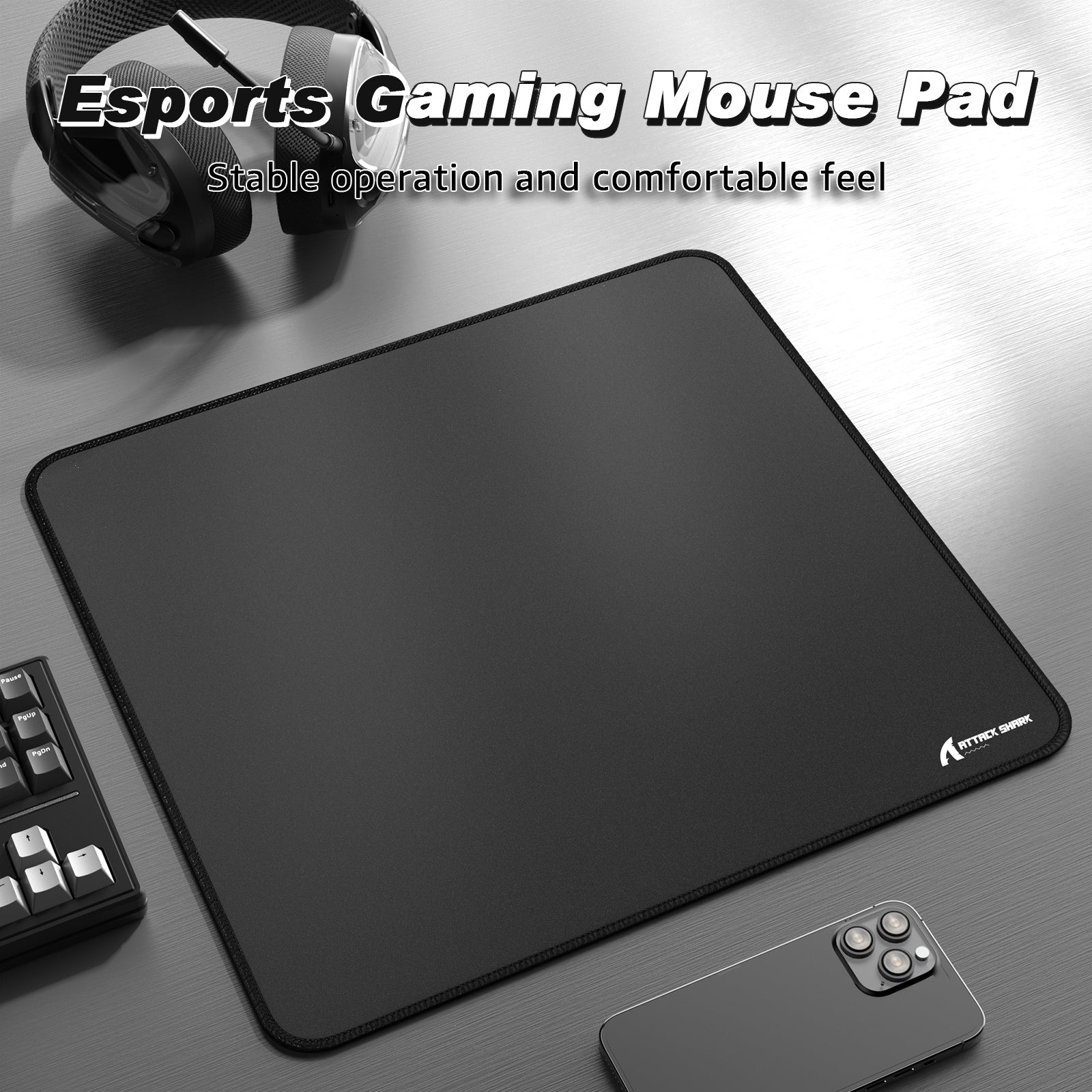 Black esports gaming mouse pad with stitched edges for stability and comfort.