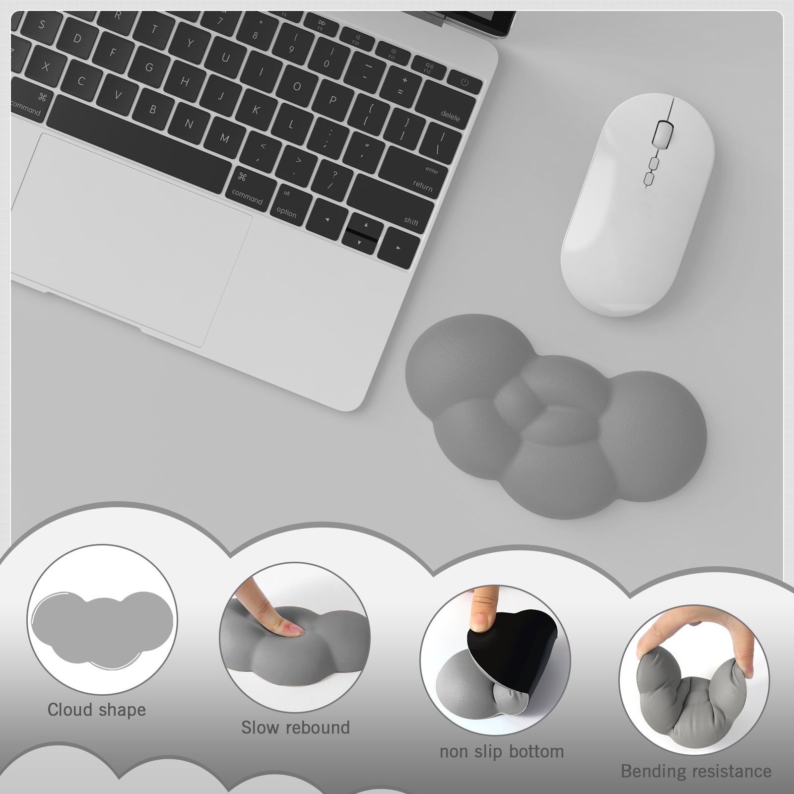 Gray cloud-shaped wrist rest for gaming mouse with non-slip base on desk.