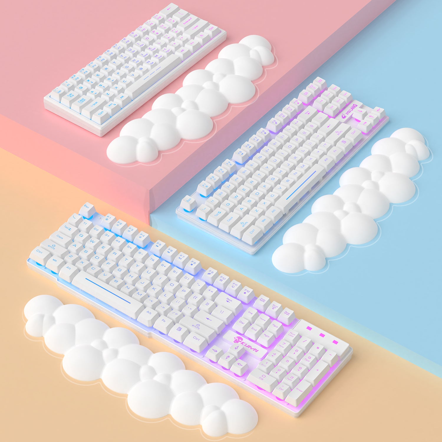 Cloud-shaped white wrist rests beside colorful mechanical keyboards.