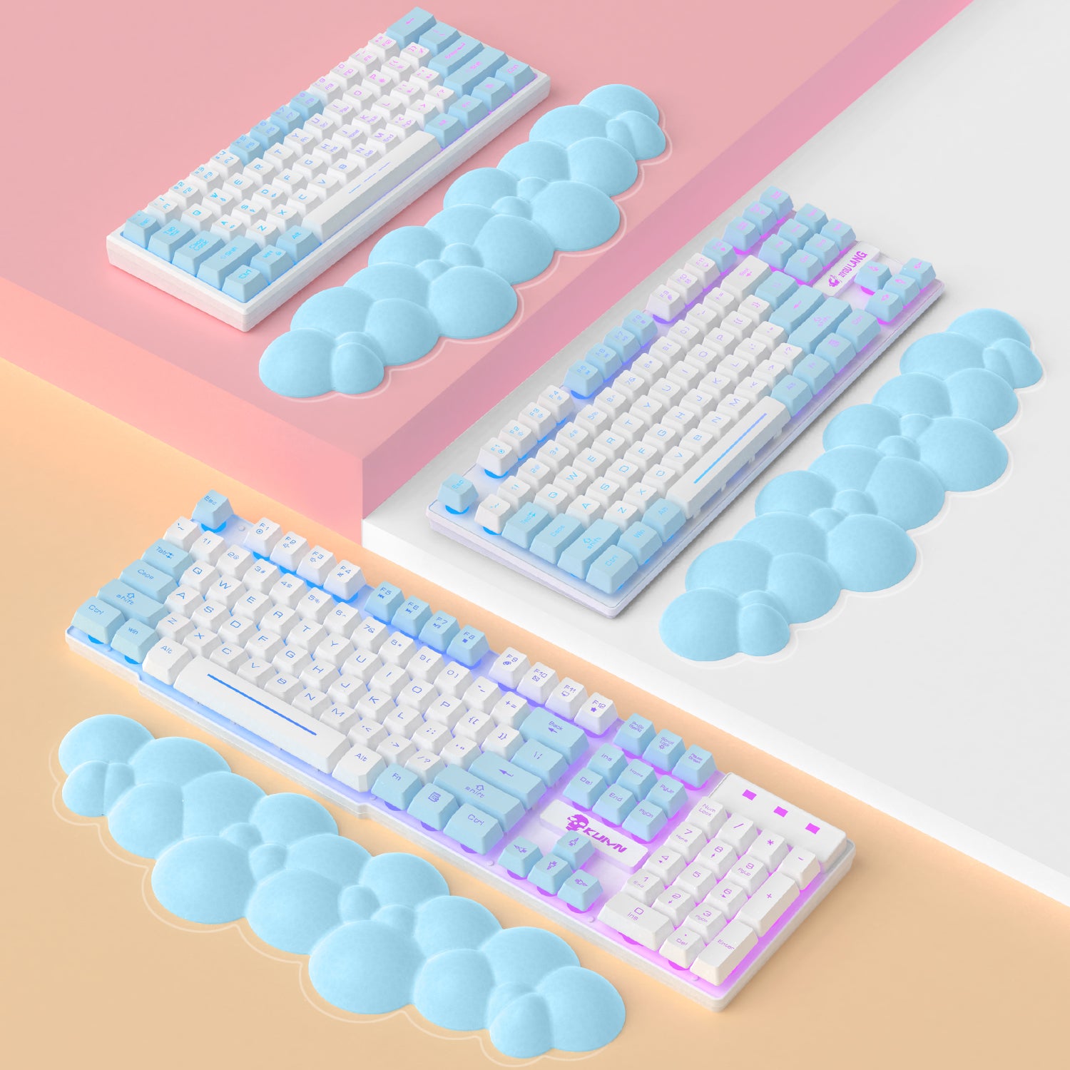 Cloud-shaped ergonomic wrist rests in light blue alongside mechanical keyboards.