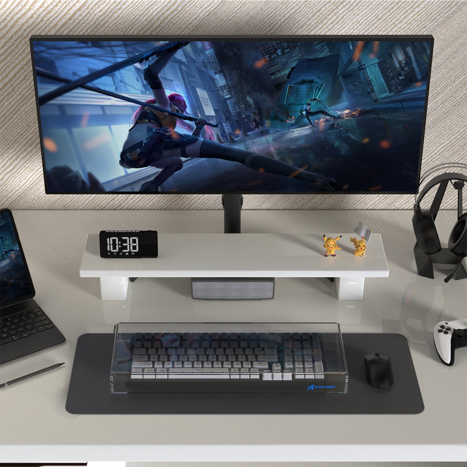 Gaming setup with 98 keys keyboard covered by clear acrylic on a white desk.