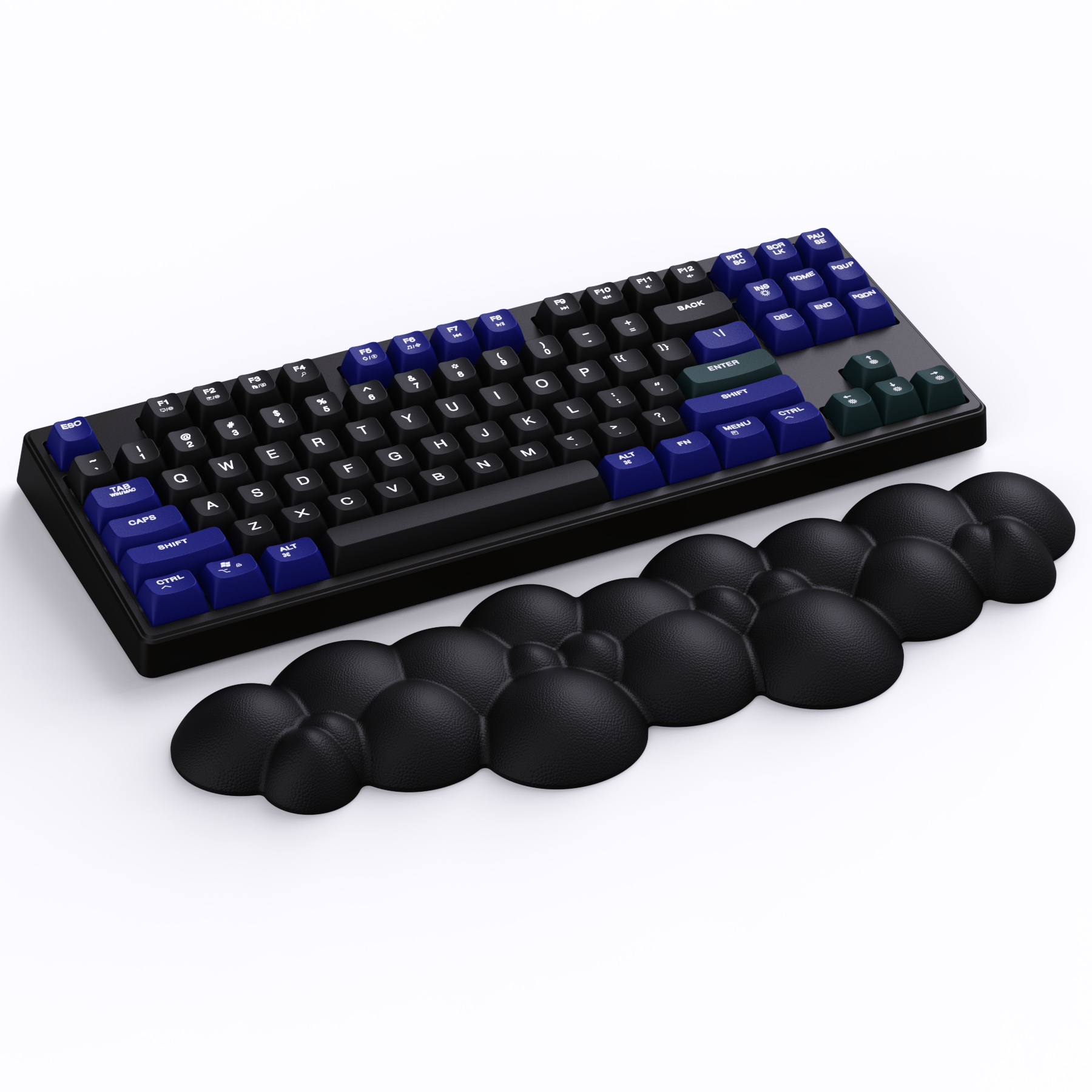 Black cloud-shaped wrist rest beside colorful mechanical keyboard with blue and black keys.