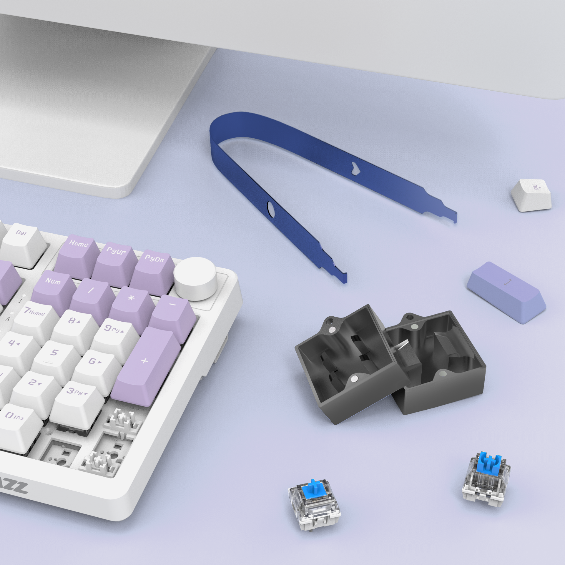 Blue switch opener kit with two switch housings on a purple keyboard background.