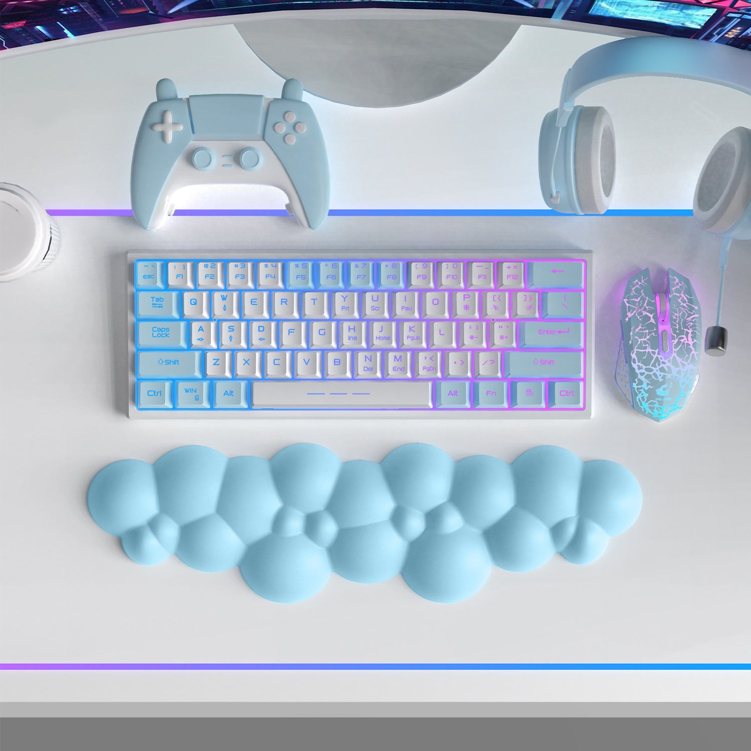 Light blue cloud-shaped ergonomic wrist rest under a pastel keyboard and gaming accessories.