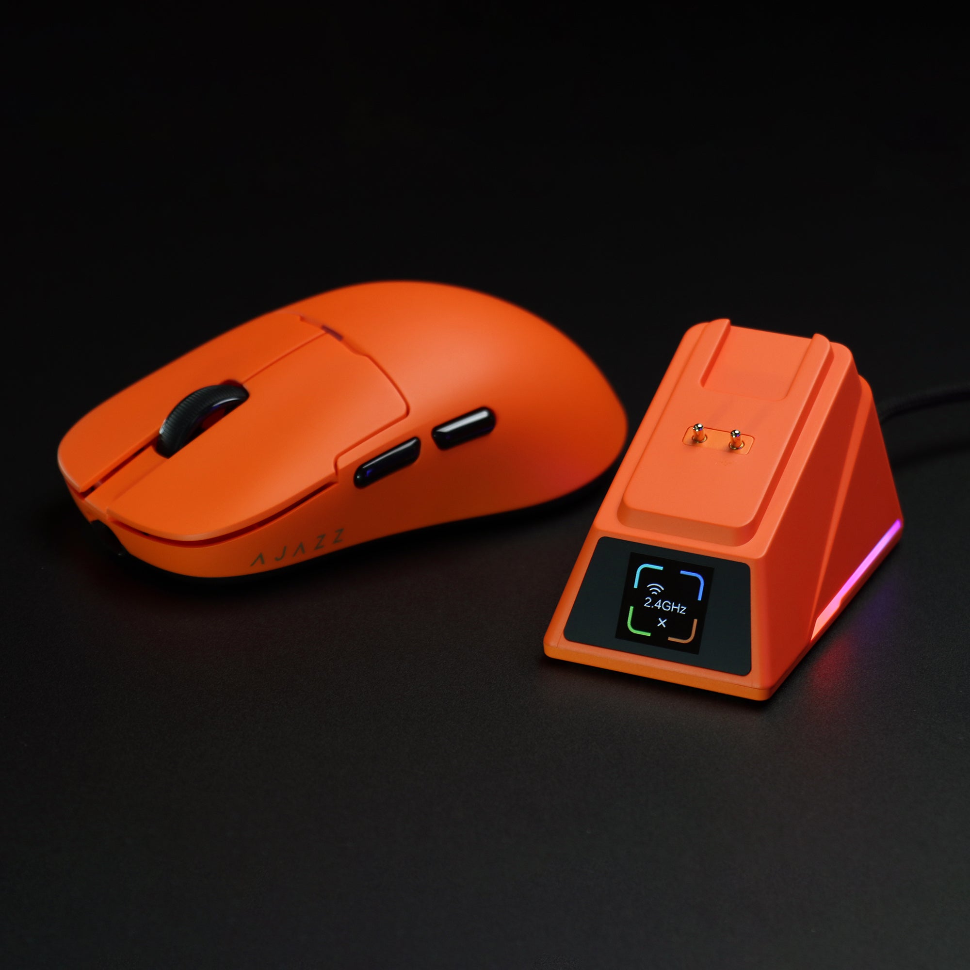 Orange AJAZZ AJ159 APEX mouse with 8K charging dock displaying connectivity mode.